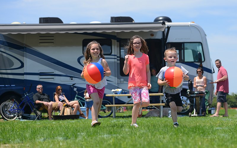 kids running by rv